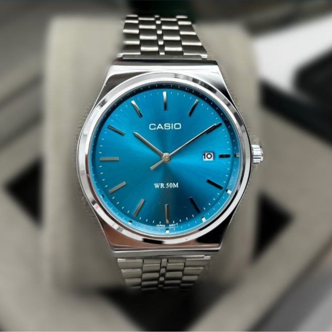 ساعت مچی مردانه کاسیوCASIO وینتیج بند نقره ای صفحه نمایش گرد رنگ بندی کد 9023