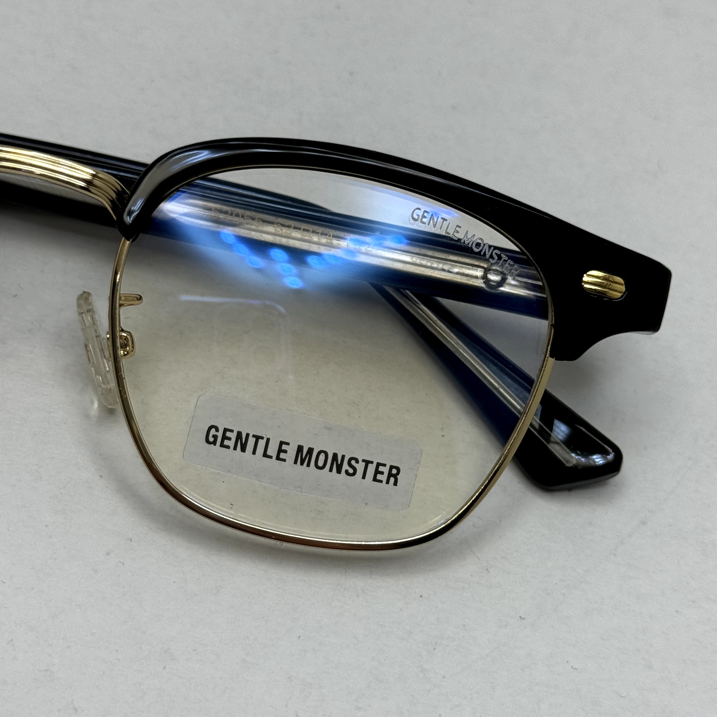 فریم عینک طبی بلوکات کلاب مستر برند جنتل مانستر دسته سیم کره ای طلایی مشکی