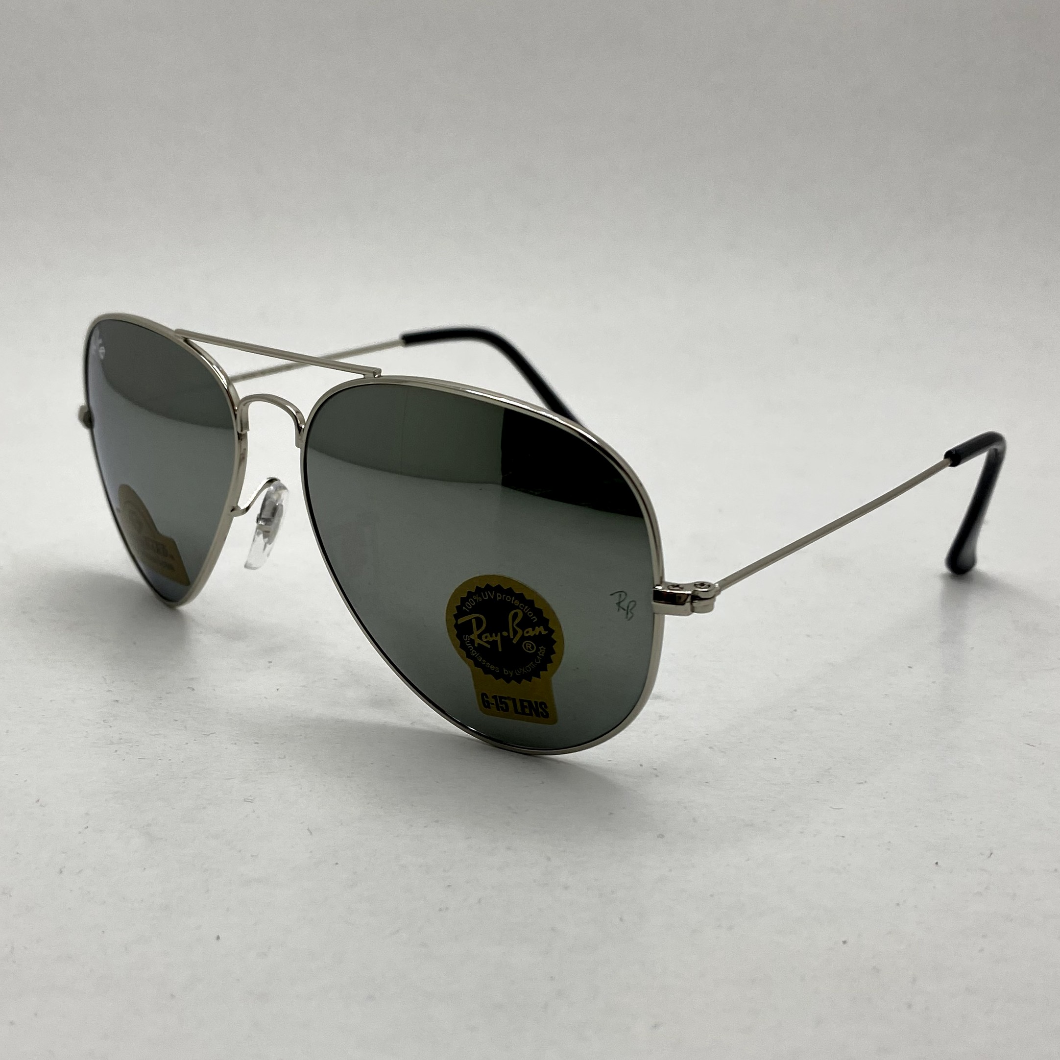 عینک آفتابی خلبانی AVIATOR ریبن rayban شیشه سنگ ایتالیایی آینه ای فریم نقره ای سایز 3025 فول پک
