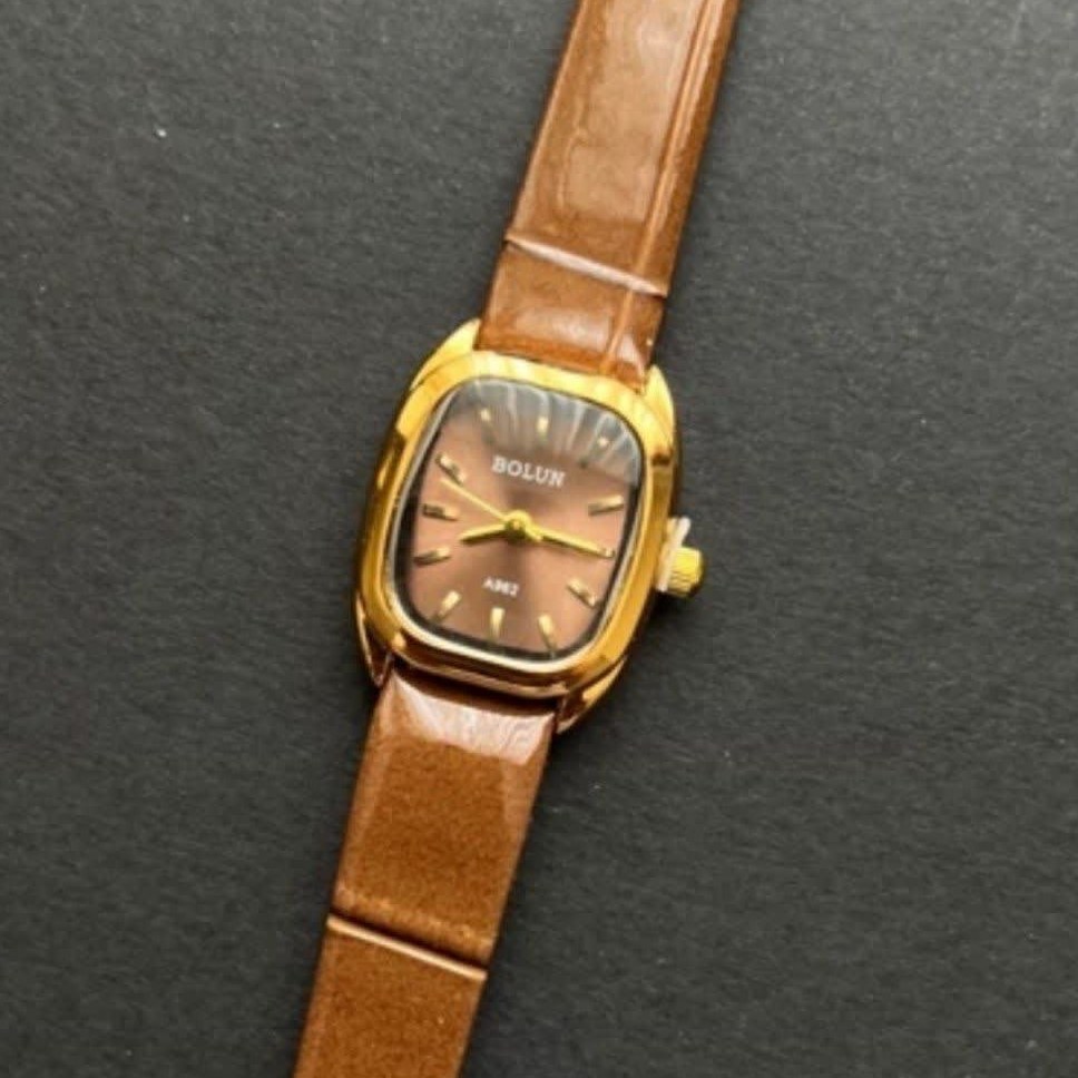 ساعت دخترانه بند چرمی بند قهوه ای صفحه قهوه ای