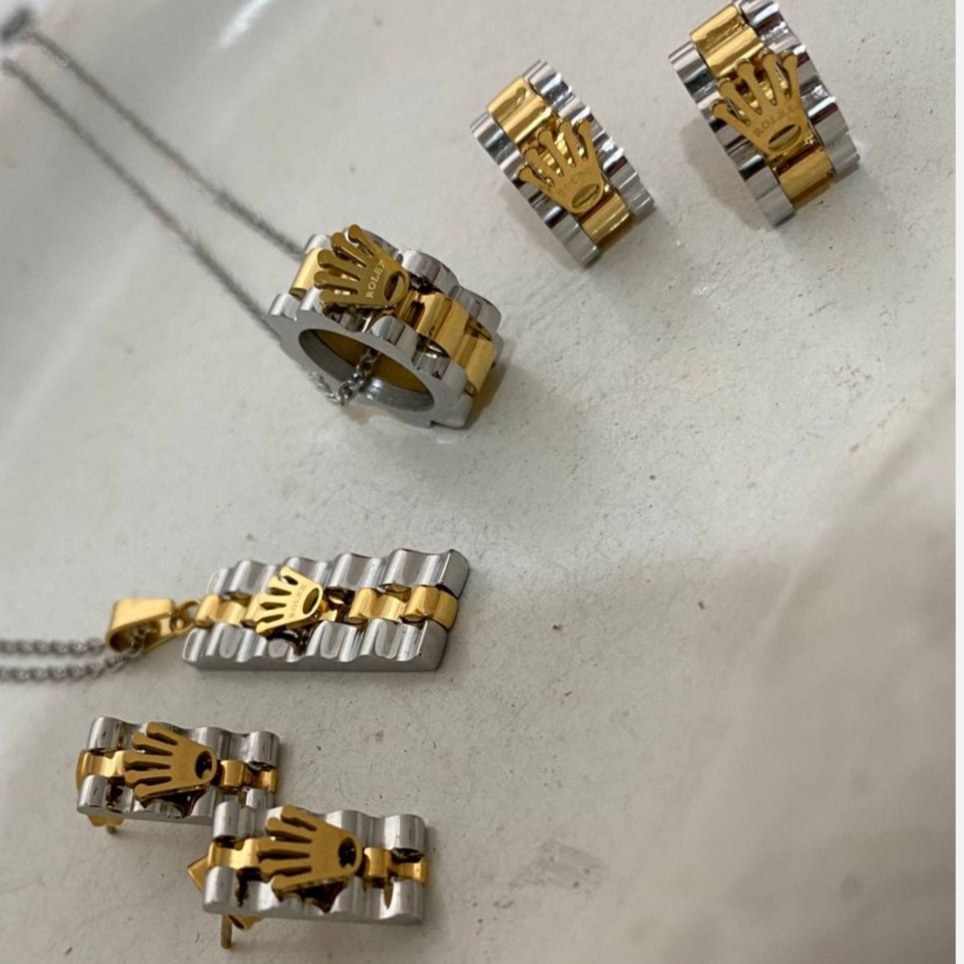 نیم ست گردنبند و گوشواره استیل زنانه طرح رولکس Rolex در دو مدل رنگ ثابت کد tj (پس کرایه)