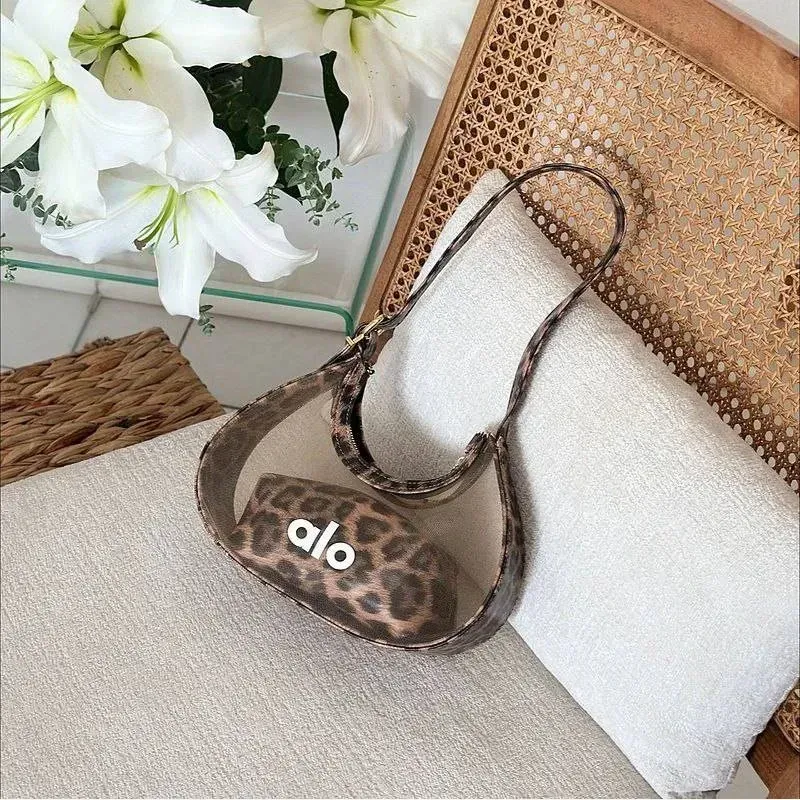 کیف پلنگی چرمی زنانه طرح پلنگی توری