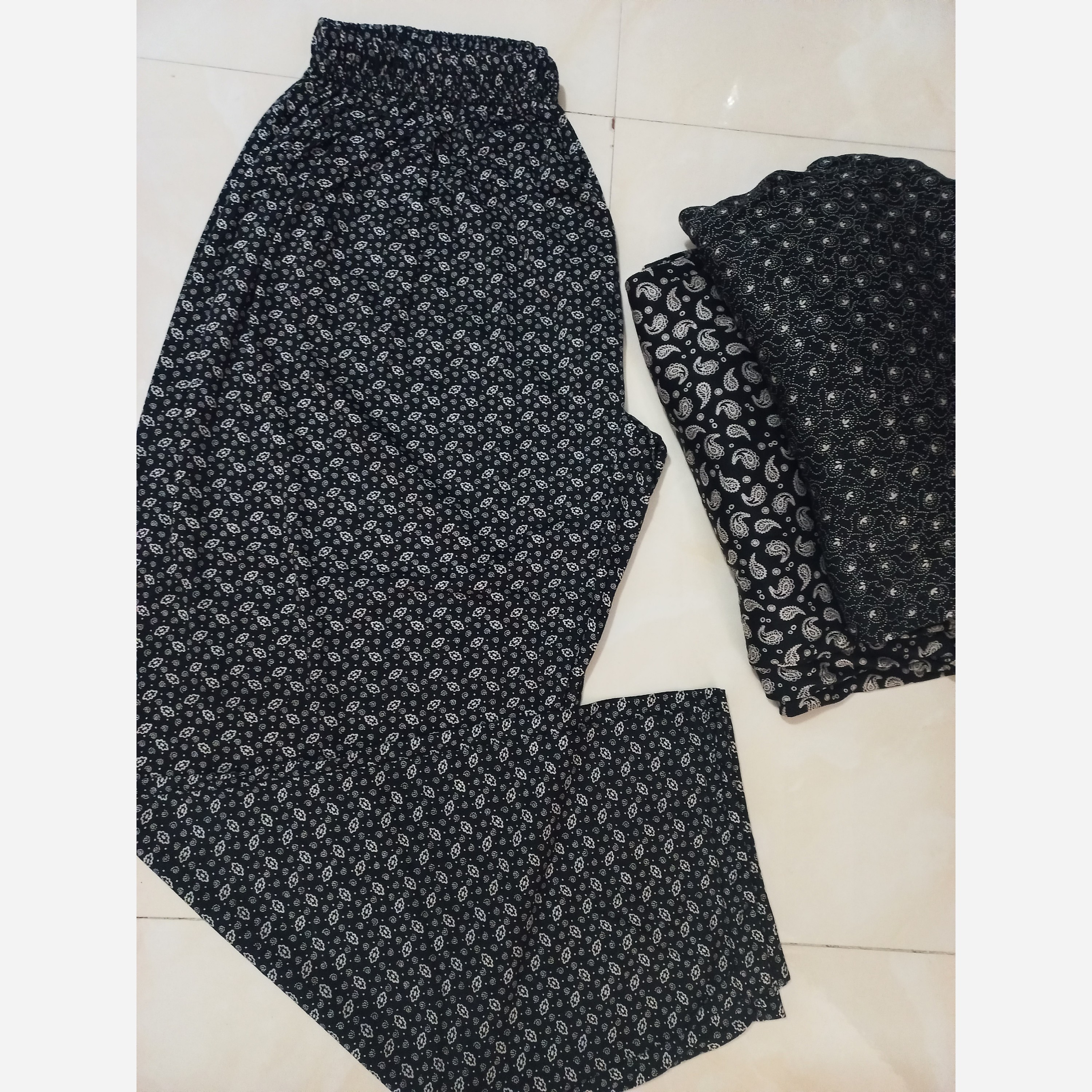 شلواربرداشت راحتی زنانه قواره ( سایز بزرگ) گرم بالا طرح دار مناسب سایز 50 تا 70 فری سایز