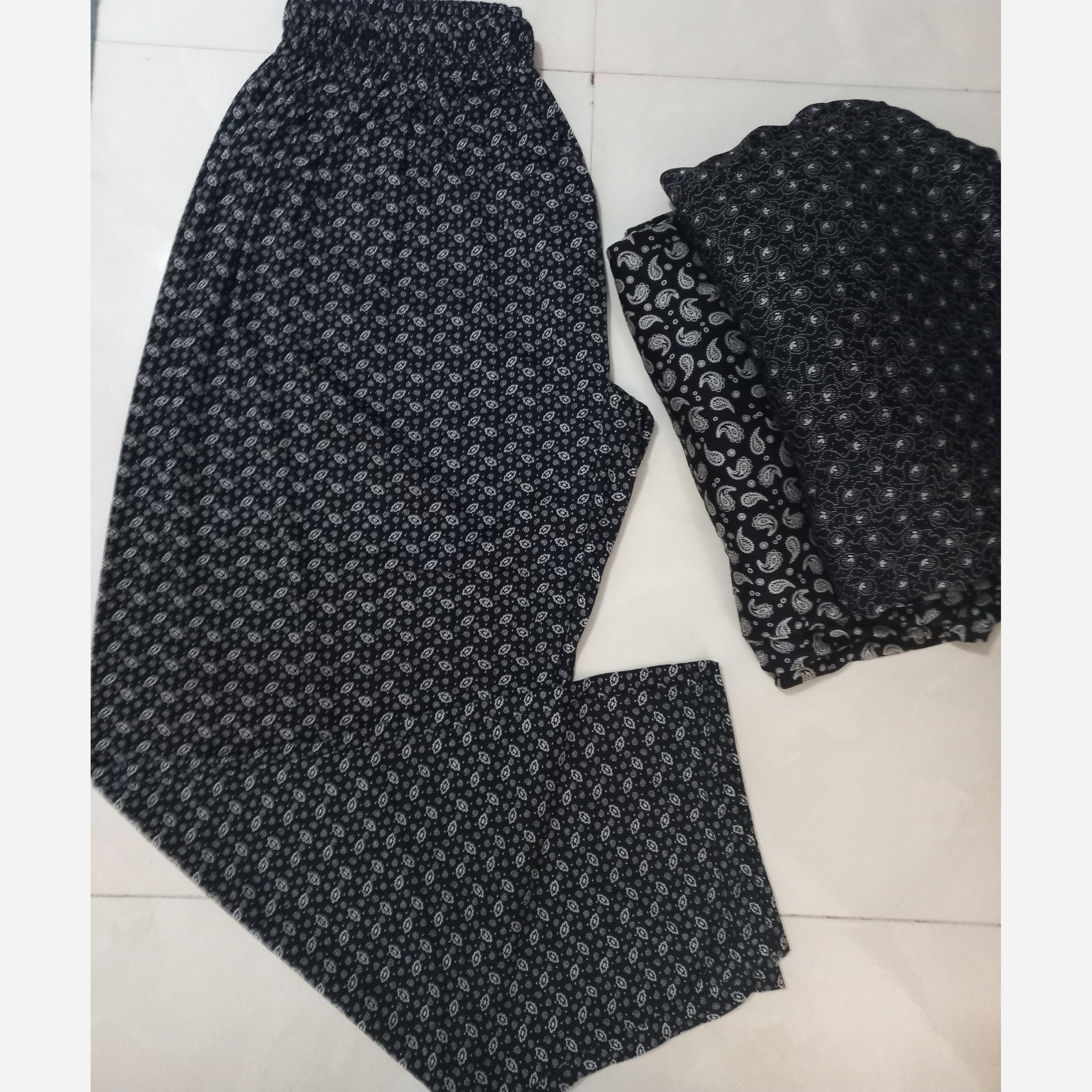شلواربرداشت راحتی زنانه قواره ( سایز بزرگ) گرم بالا طرح دار مناسب سایز 50 تا 70 فری سایز