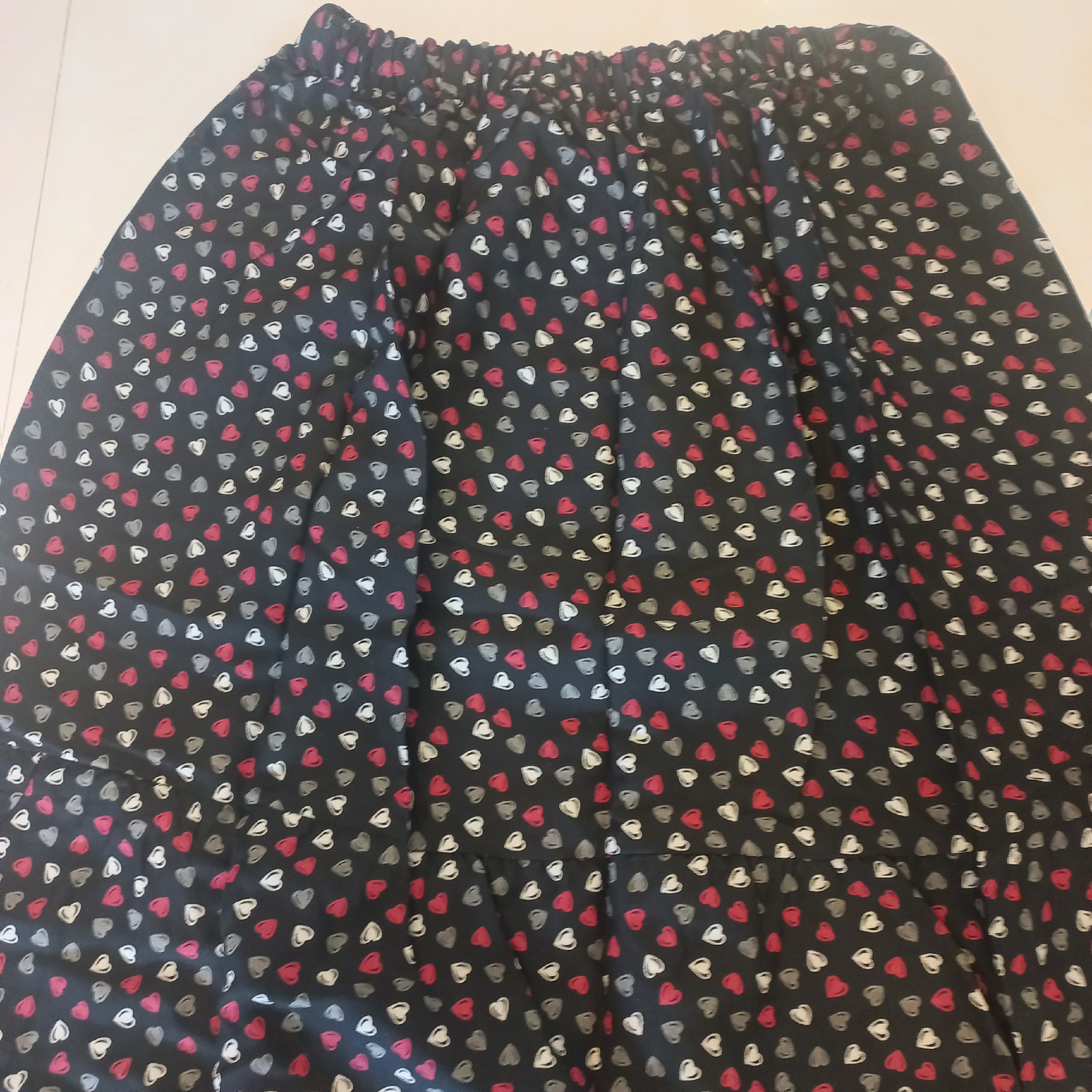 دامن زنانه ودخترانه کلوش کوتاه نخی قد65طرح دار