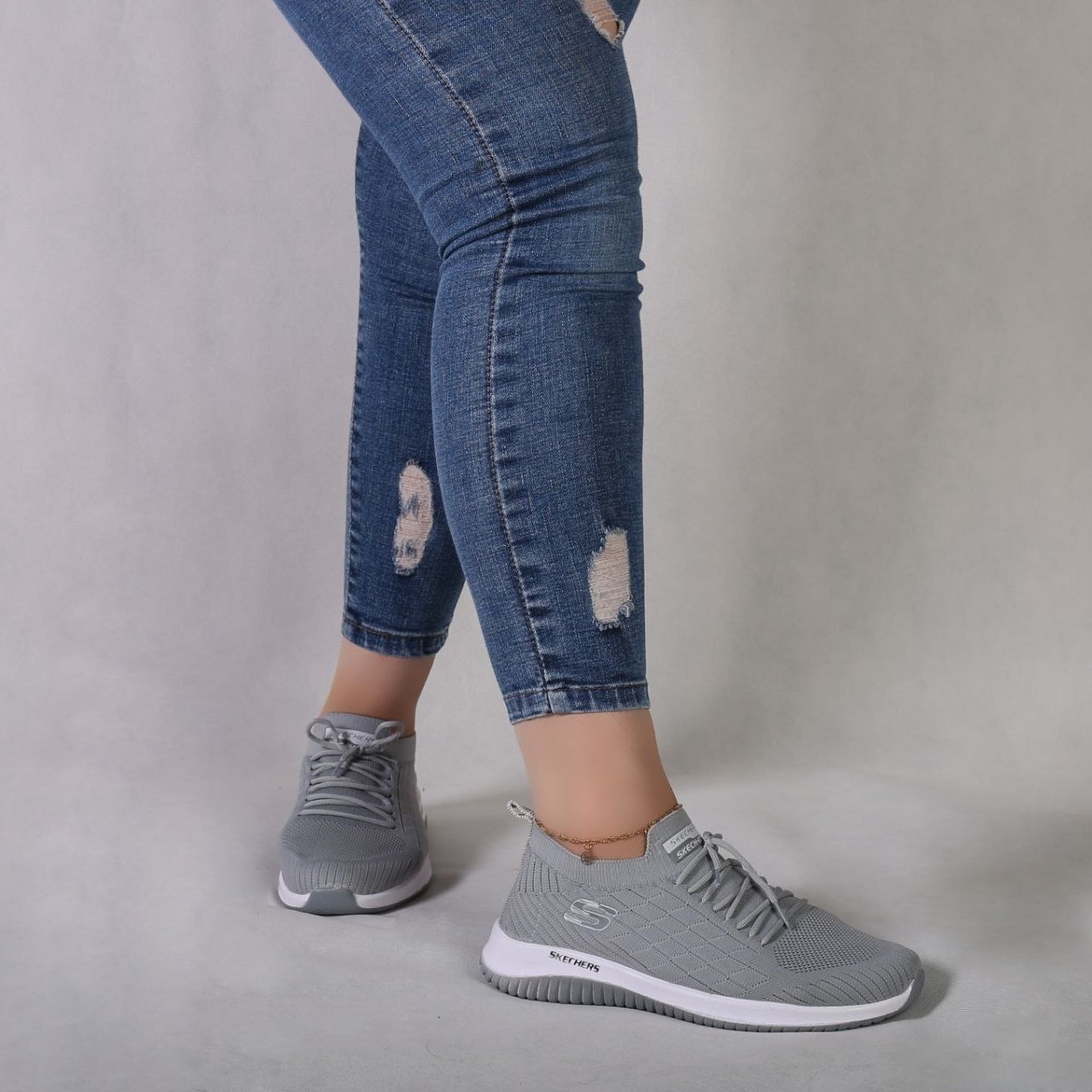 کتونی اسکچرز Skechers طوسی سفید مشکی جورابی راحت گووالک اسپرت مردانه و زنانه و بچه گانه از سایز 27 تا 45