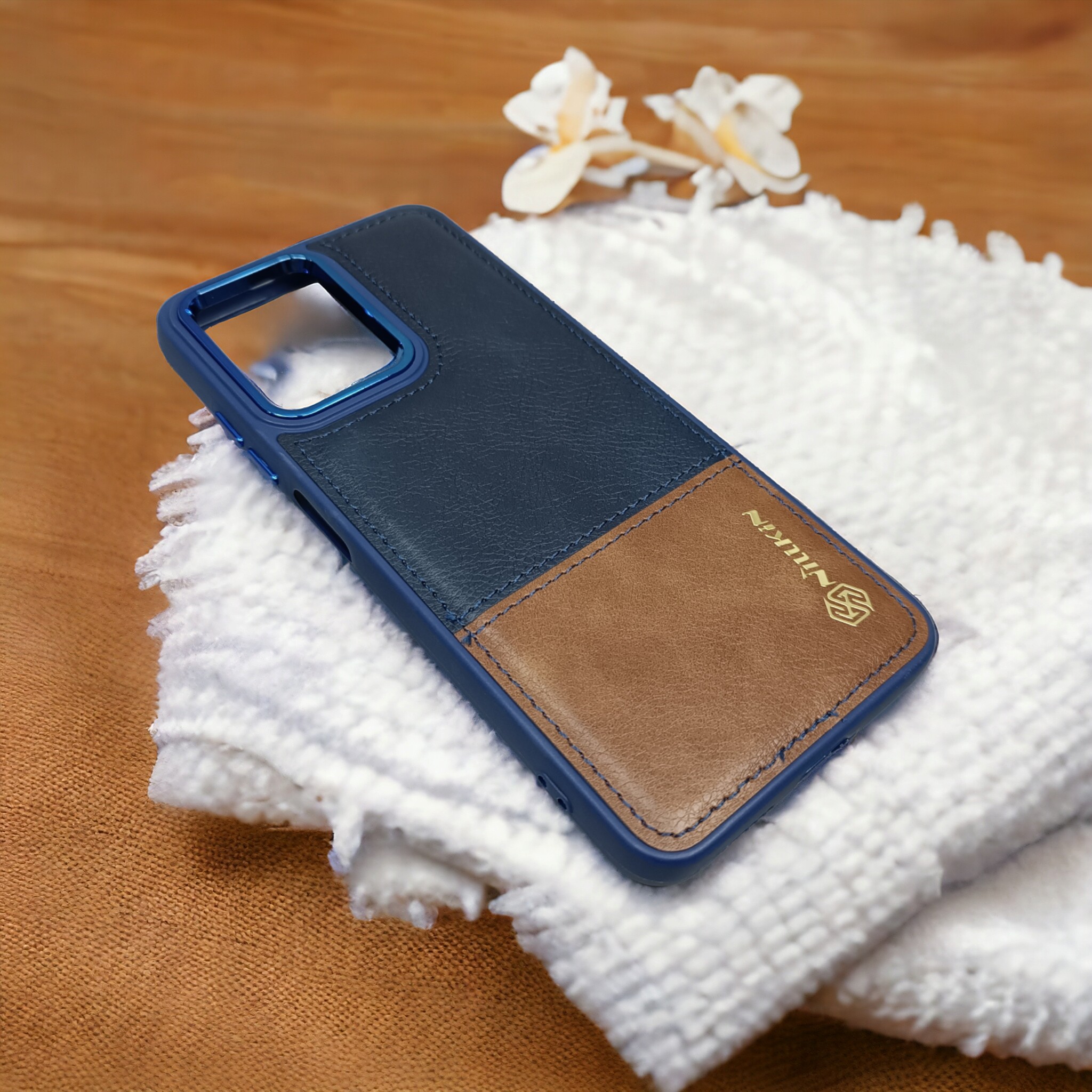 کاور چرمی دکمه فلزی مدل NILKIN مناسب برای گوشی موبایل Xiaomi Poco X4 GT