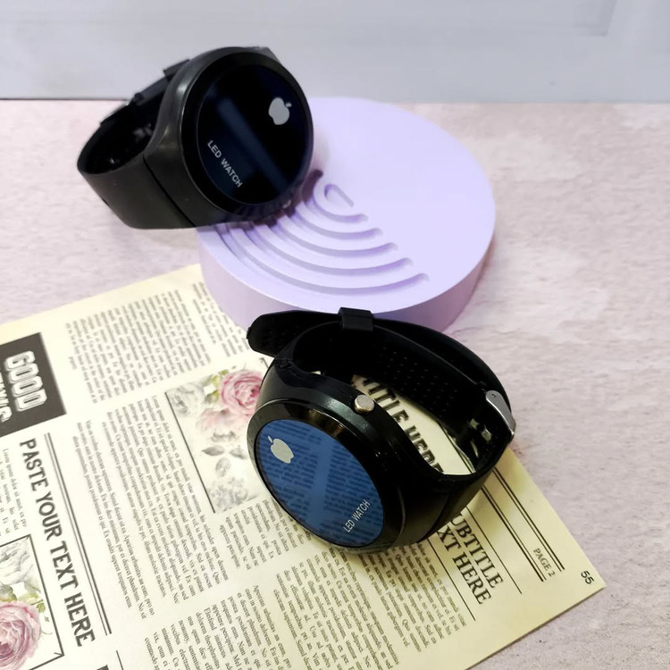 ساعت مچی دیجیتالی صفحه گرد اسپرت طرح اپل،دارای ساعت و تقویم روزشمار،دارای بند کشویی و قابل تعویض با قفل سگکی