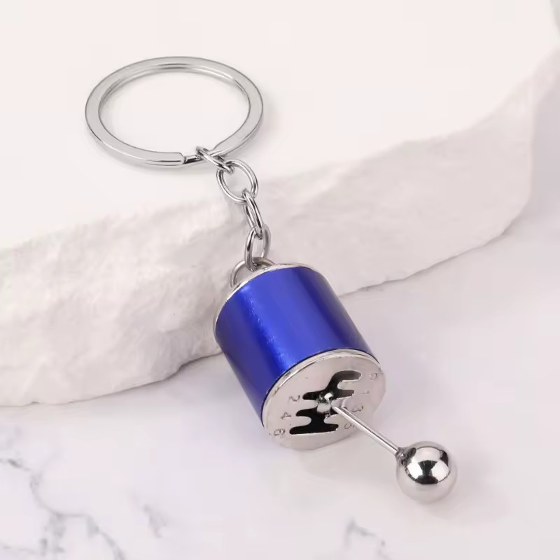 جاکلیدی فلزی (ضد زنگ) اسپورت طرح دنده خودرو،متحرک و دارای 6 دنده با قابلیت تعویض دنده،در رنگهای متنوع و شاد
