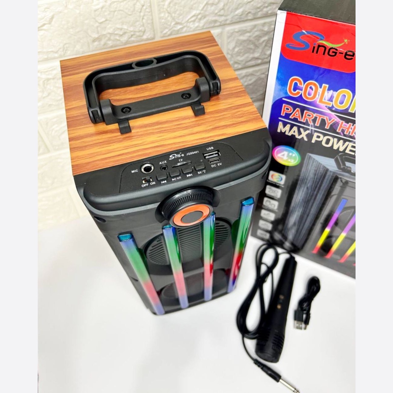 اسپیکر بلوتوثی سینگ ای پارتی باکس طرح چوب رقص نور RGB + میکروفون بمب رم خور فلش خور قابل حمل میکروفون دار(پس کرایه)