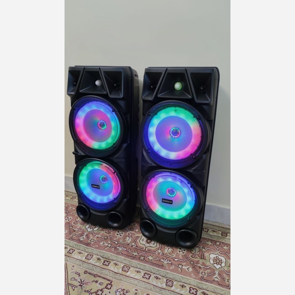اسپیکر بلوتوثی ZQS 8210 اصلی بهمراه میکروفون بی سیم و کنترل کیفیت عالی